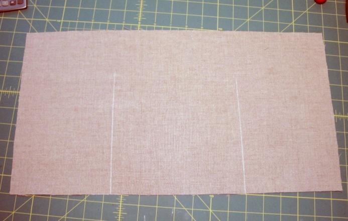 Iron the interfacing to the wrong sides of the outer bag linen