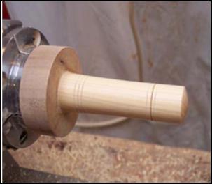 When the threads are satisfactory, you are ready to mount the base section for drilling and threading of the tenon that will be threaded. Threading the tenon on the top of the base section.