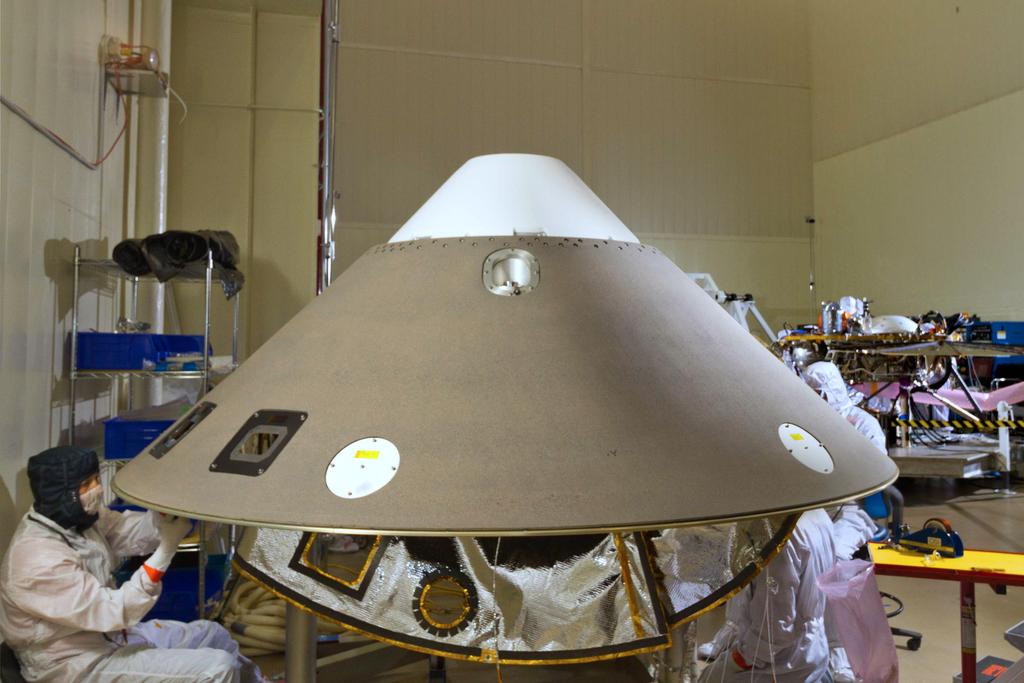 InSight CO2 Aftbody Radiation Implications InSight Backshell Assembly New Physics still rears its head in EDL InSight, a Discovery Class mission, relies on a nearly build-toprint Phoenix aeroshell in
