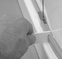 6. Check the gap between the bottom edge of the door glass and the shower tray is 5mm and even across the door width using the alignment gauge.