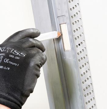 Ensure the frame is plumb and once level secure with x2 screws either side. square.