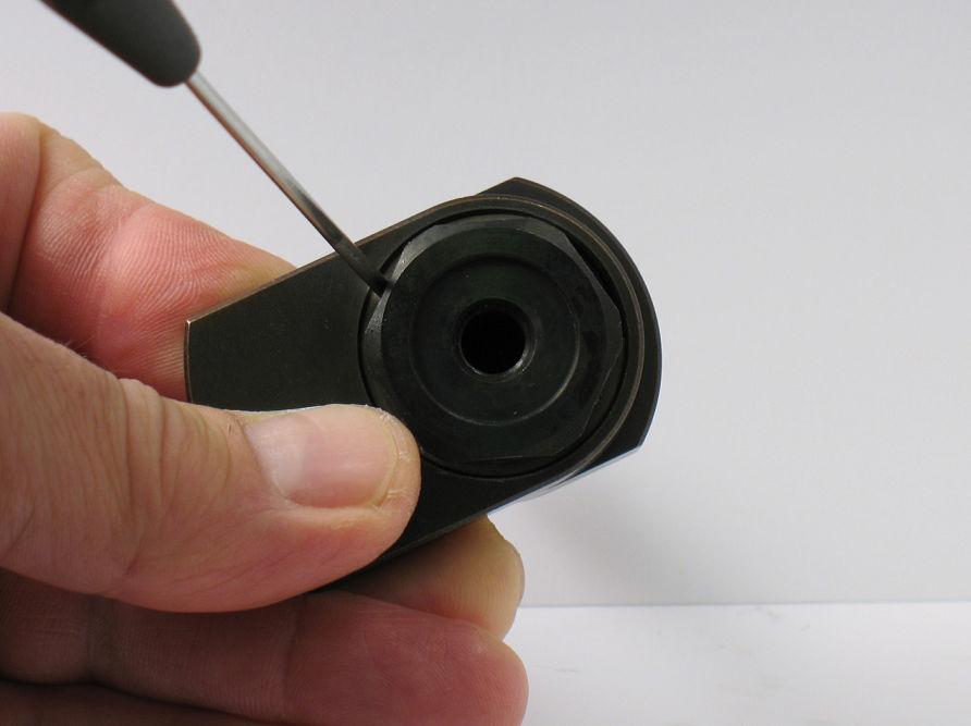 5. Use a thin slot-blade screwdriver to compress and install 95630 Snap Ring