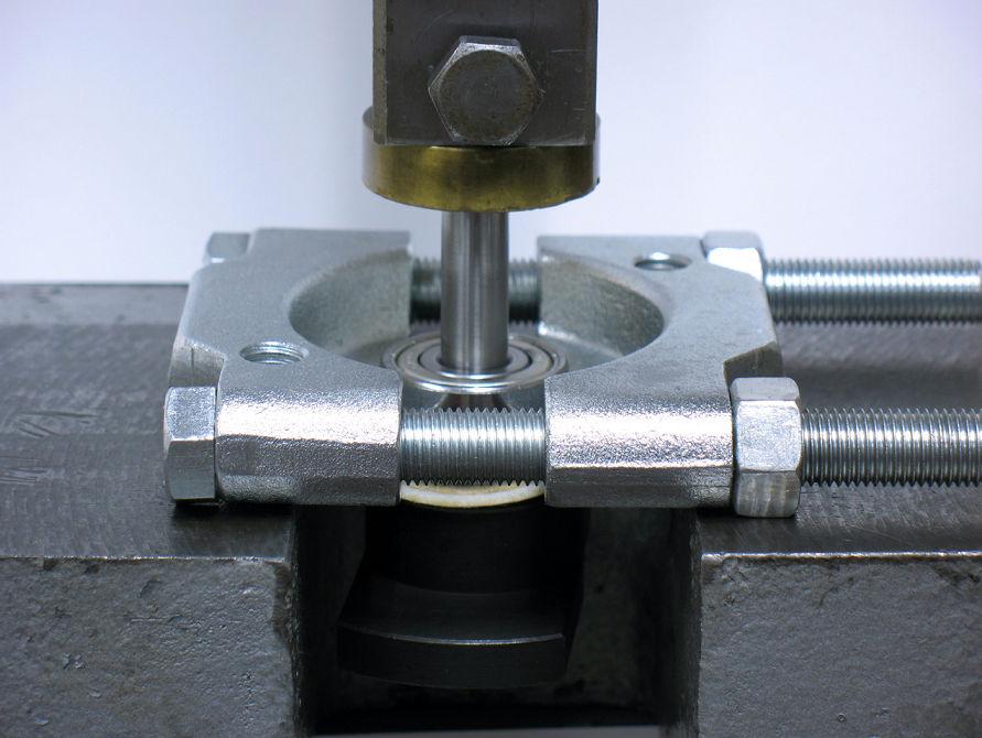 7. Fasten bearing separator between 58368 Bearing and the counterweight.