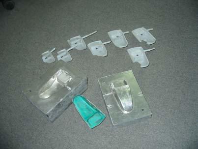 form of granules. After the cooling time of the mould, the mould has been opened to extract the injected part, shown in figure 4. Master SLS model Figure 4.