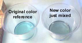 20. 21. Here's where I compared my new color to the test color. The cup on the left was from the test piece. The cup on the right is the color we're mixing up now.