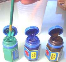 For 3 ounces of resin, add one drop of green ink wash, one drop of blue ink wash and 1/2 drop of brown ink wash.
