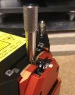 3. Place the Cantilever Insertion Tool into the designated hole behind the Alignment