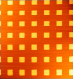 a) b) Figure 11: a) Closed-loop AFM image of a 10x10µm pitch calibration grating with