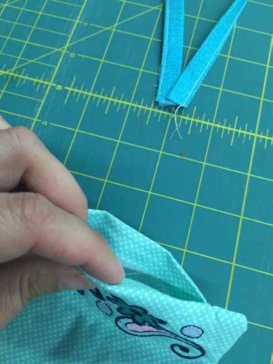 center crease, right sides together. Press in place.