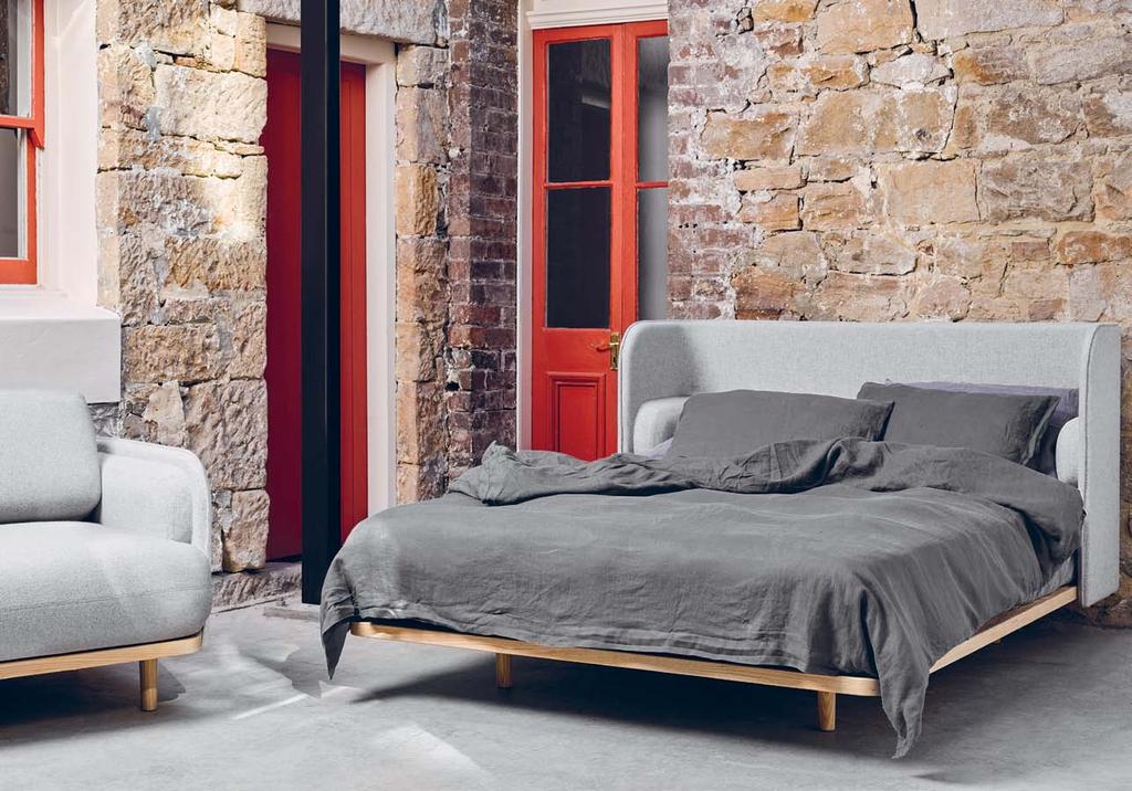 Aran 17 - The timelessly luxurious Aran range includes a bed, armchair and sofa, all which feature a unique hand-stitched and piped bolster detail that gives the design a layered depth.