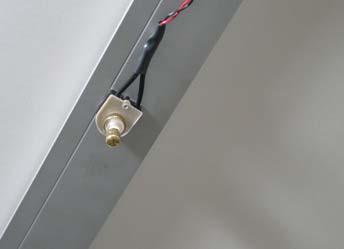 Pull upward to eliminate any excess wire slack, and loop the excess wire through one of the cable ties.