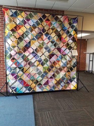 don t have speedy internet, please be patient. We were welcomed by this wonderful quilt it s the guild raffle quilt. WOW. Impressive for sure! We were also met by lots of welcoming ladies.