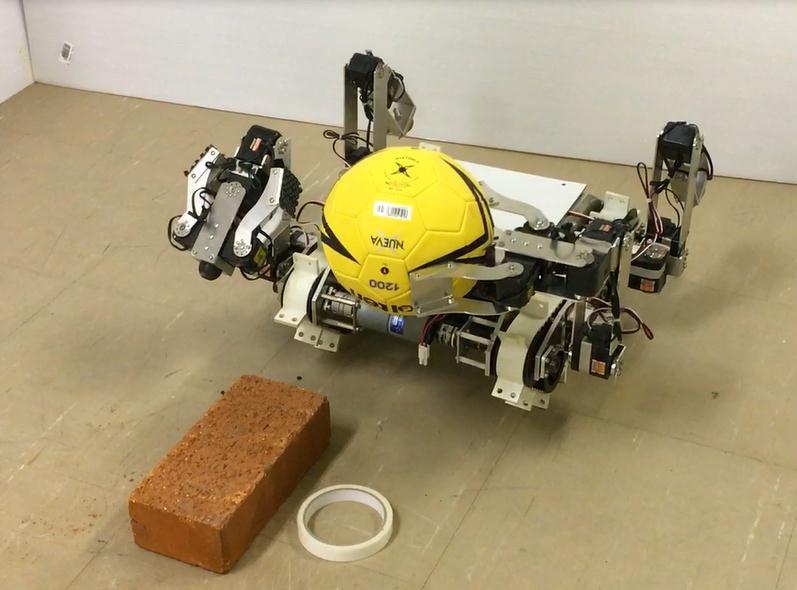 30.5 degrees. In this experiment, the robot was also able to lift the object up stably. This type of handling task has never been possible by the arm in original mechanism.