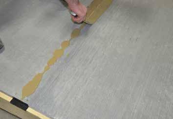3. TONGUE AND GROOVE REPAIR WITHOUT ACCESS TO THE BOTTOM OF THE PANEL CONT. E. Mix 6 parts USG Durock EXG Concrete Repair Patch to 1 part water by volume, or 2.0 2.5 quarts (1.9 2.