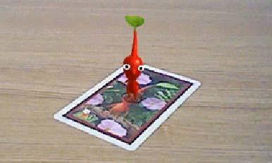 2 Playing with Photos with Pikmin Photos with Pikmin lets you take photos together with the characters that appear on your AR Cards!