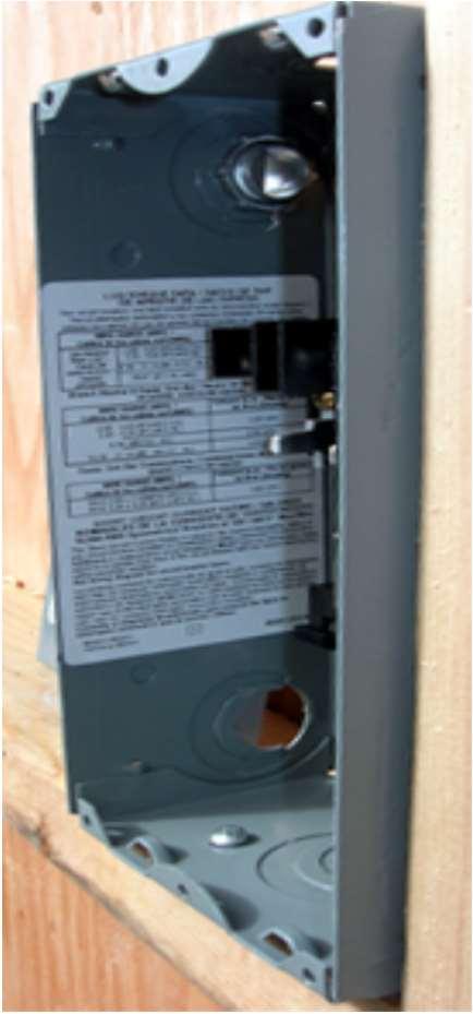You are outside looking up 7. Mount the electrical panel a. Install a 2x4 Horizontal brace in the wall bay about 5 feet above floor level.