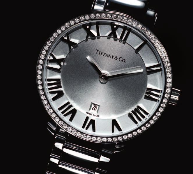 Atlas 2-Hand 31 mm Atlas, complemented by a halo of round brilliant diamonds, makes a refined