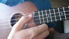 Use the soft part of your thumb to pluck Figure 2: Top right: Tuner showing pitch too low the top string loud enough to be heard by Top Center: Pitch is in tune the tuner 3.