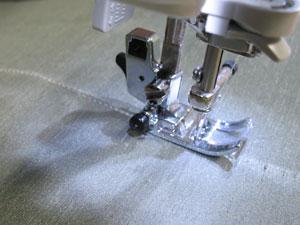 Sew along the bottom edge of the interfacing from side to side of