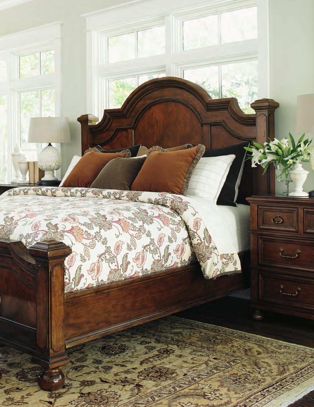 The design features distinctive moldings on the crown and bedposts, with finished