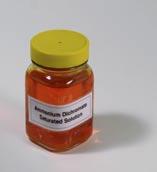 Note of Caution The distilled water, now a bright orange, is saturated and can be drawn off when needed. Ammonium dichromate is a chemical and should be handled with due respect.