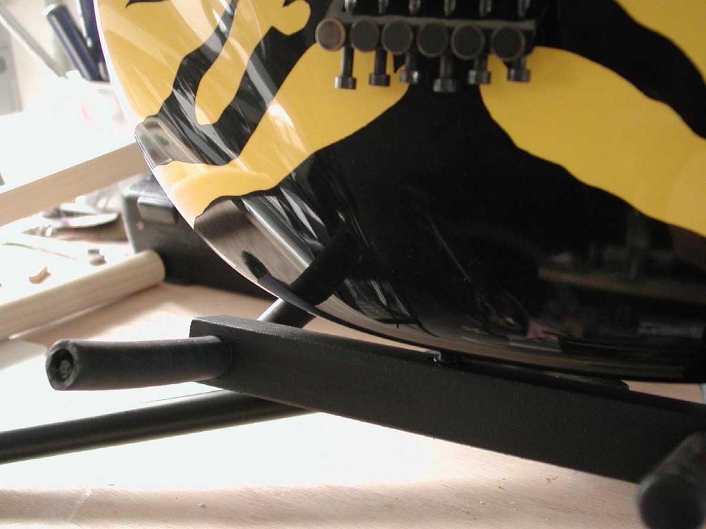 resting on your guitar stand s rubber arms.