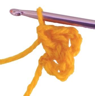Treble Crochet - Yarn around hook (from the back) put hook through