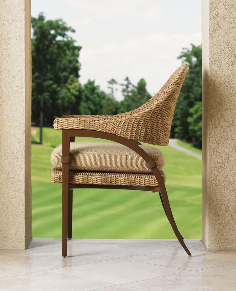 The graceful sweep of the back leg on the Dining Chair make it a design statement unto itself.