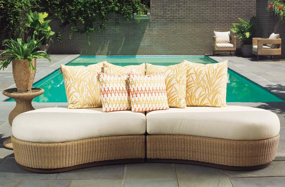 The 104" Armless Sofa has a dramatic butterfly silhouette comprised of symmetrical left and right