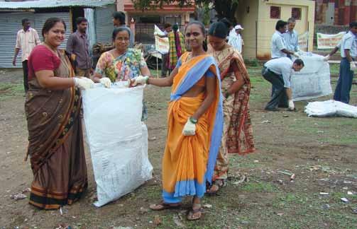 Disadvantaged residents got jobs sorting wet waste from dry waste as part of an Environmental Challenge project in Pune, India.