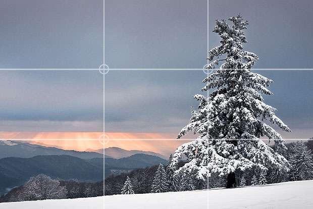 In landscape shots, it's common to position the horizon along the center of the frame, but this can give the photo a "split in two" feel. Instead, place it along one of the horizontal lines.