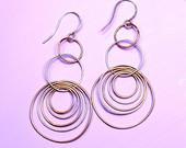 Earrings E12. Pink Gold + Silver Circle Hoops E22-G. Gold Diamond Studs E23-G.
