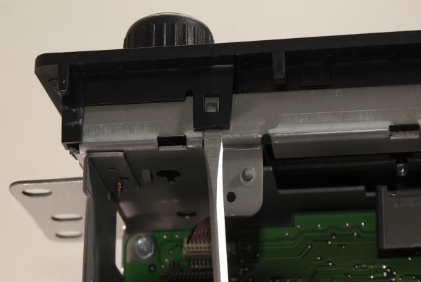 Step 6: Now that the front faceplate is no longer connected to the PCB board, the front faceplate can be