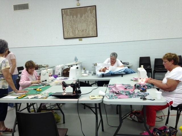quilts under the guidance of the friendship quilters.
