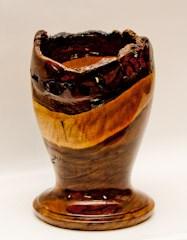 walnut from November, turned a natural edge vase.