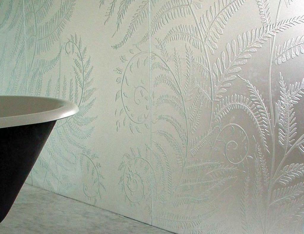 SURFACE DECORATED GLASS Our surface decorated products are manufactured using the more traditional forms of glass decoration including at or deep carved sandblast, acid etch, bromish and mottle.