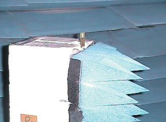 Figure 7 shows photographs of the setup for radiation pattern measurement of the chip antenna in an anechoic chamber.