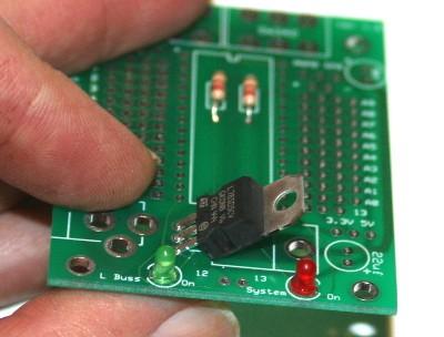 Step 5. Soldering in the voltage regulator is best done in a few steps to ensure proper alignment.