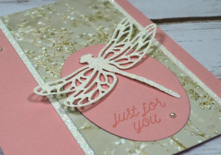 Cut the Falling in Love Designer Series Paper 2 ½ x 5 ½ 2. Attach the Glimmer Paper to the sides of the Falling In Love DSP. Attach to the card. 3.