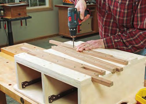 The drawer box raises the tool almost " off the bench for easier viewing when mortising, and a task light brings layout lines into sharper relief.