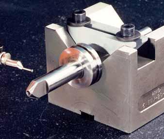 alignment and clamping of round shafts and workpieces parallel and centric to a table slot. Can be used as parallel stops and supports!