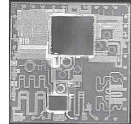 acoustic devices (SAWs), control circuits based on Si CMOS and various surface mount high-q discrete passive components are integrated on the top surface of a laminate substrate.