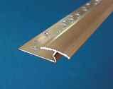 ALUMINIUM EDGINGS 28 7.8 42 : Varistrip is used to finish either glue down (without teeth) or stretch type carpet (with teeth), against ceramics or wooden flooring.