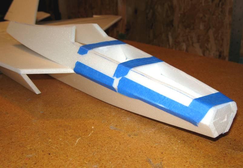 Test fit the upper forward fuselage sides, trimming and sanding as required to get a perfect fit.