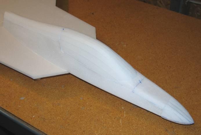 Start by tracing the top outline of the nosecone onto the foam (using the provided template) and cut it to shape with a long knife or saw.