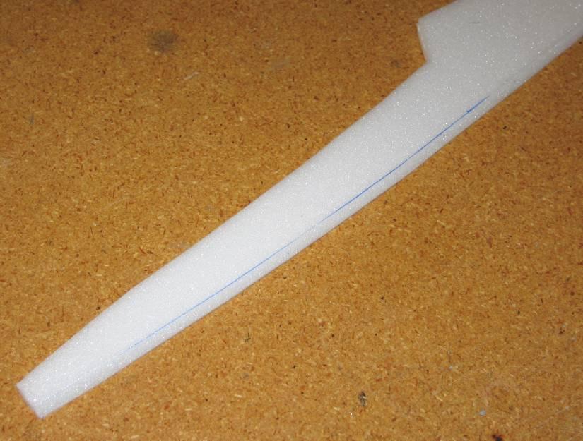 Then cut the bevel with a sharp hobby knife. You can use a straightedge for the straight segments, but the curved segments will need to be cut by hand.