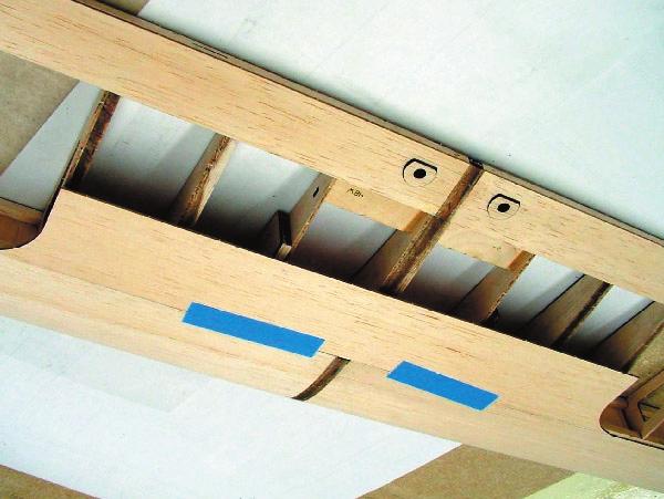 Make sure both wing halves align at the trailing edge and secure in that position with pins until cured.