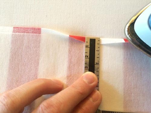 Place the overlap panel wrong side up (interfacing side up) and flat on your work surface.