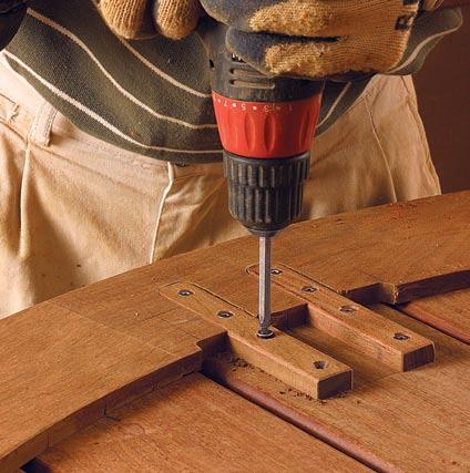 MDF spacers between the boards at the cut line to ensure consistent spacing and to minimize splintering.
