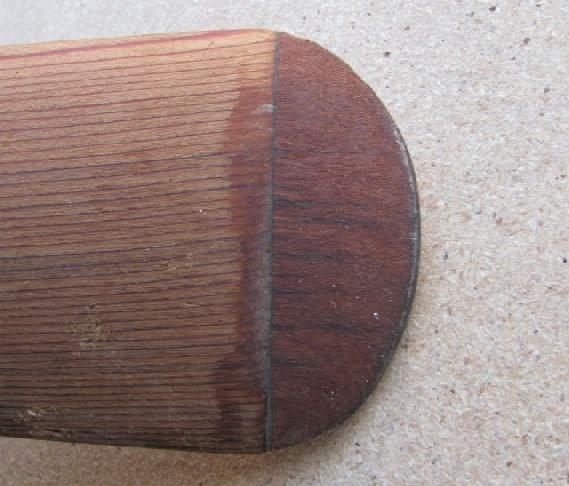 disk is flat and the sanding pieces are like pedals). Also roughly shape the foil section of the tips. Glue the tips on. Kwila tip glued to the cedar blade Finish the shaping of the paddle and tips.